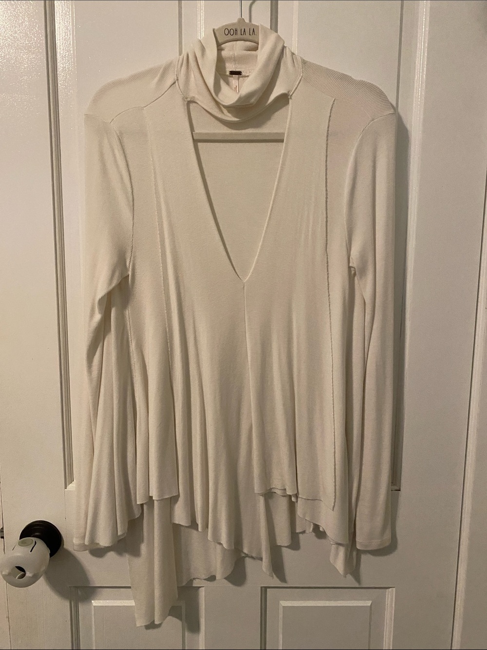 Women’s white Long-Sleeve Draped V-Neck Top with Mock Neck Asymmetrical Hem